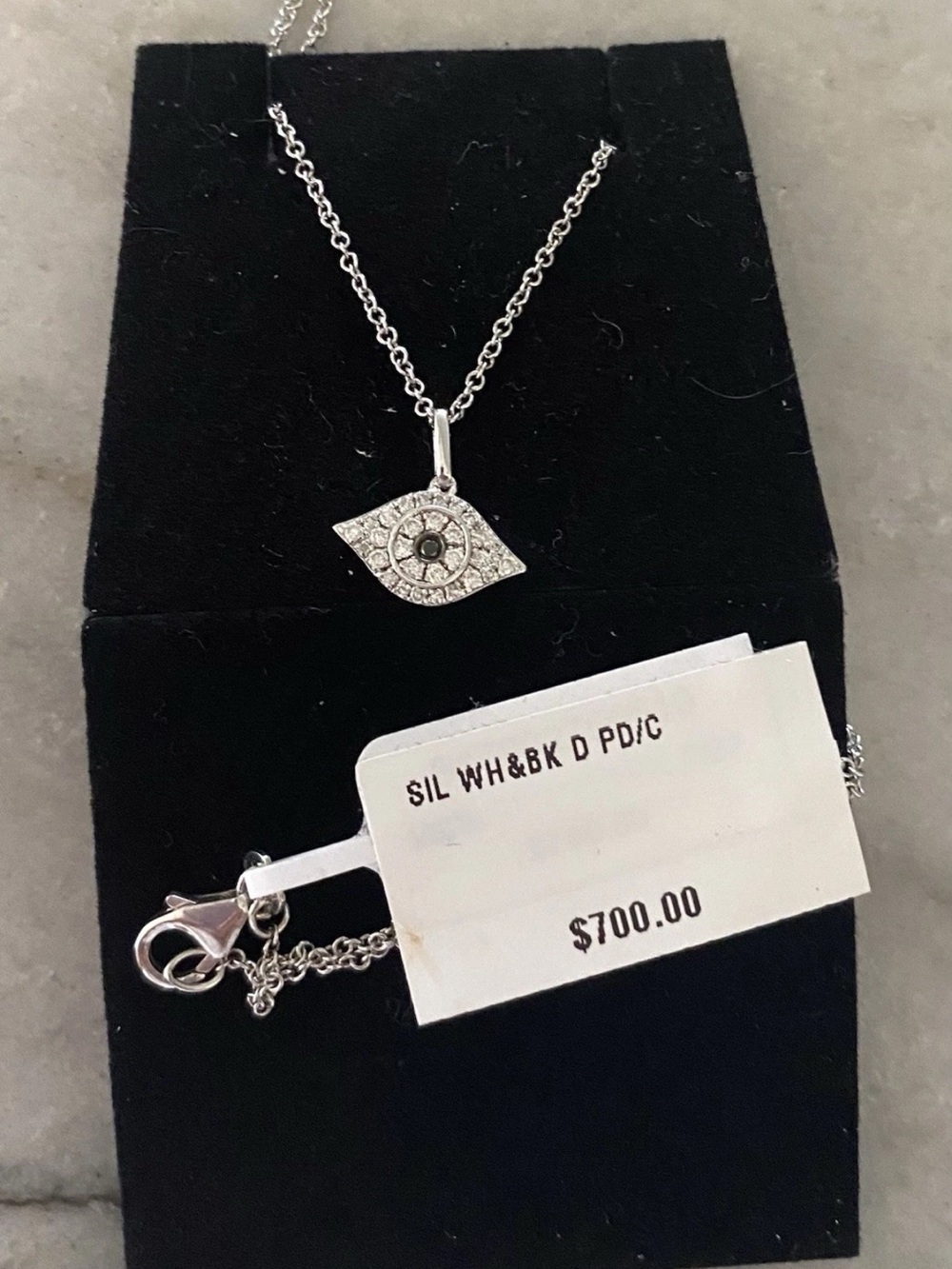 Diamond and black diamond evil eye (1/6 ct tw) 18” pendant necklace ssilver